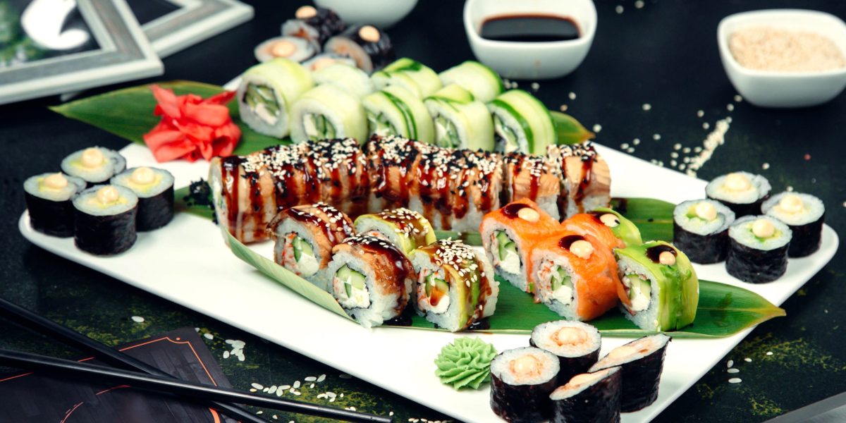 sushi rolls topped with sesame sushi rolls topped with sesame